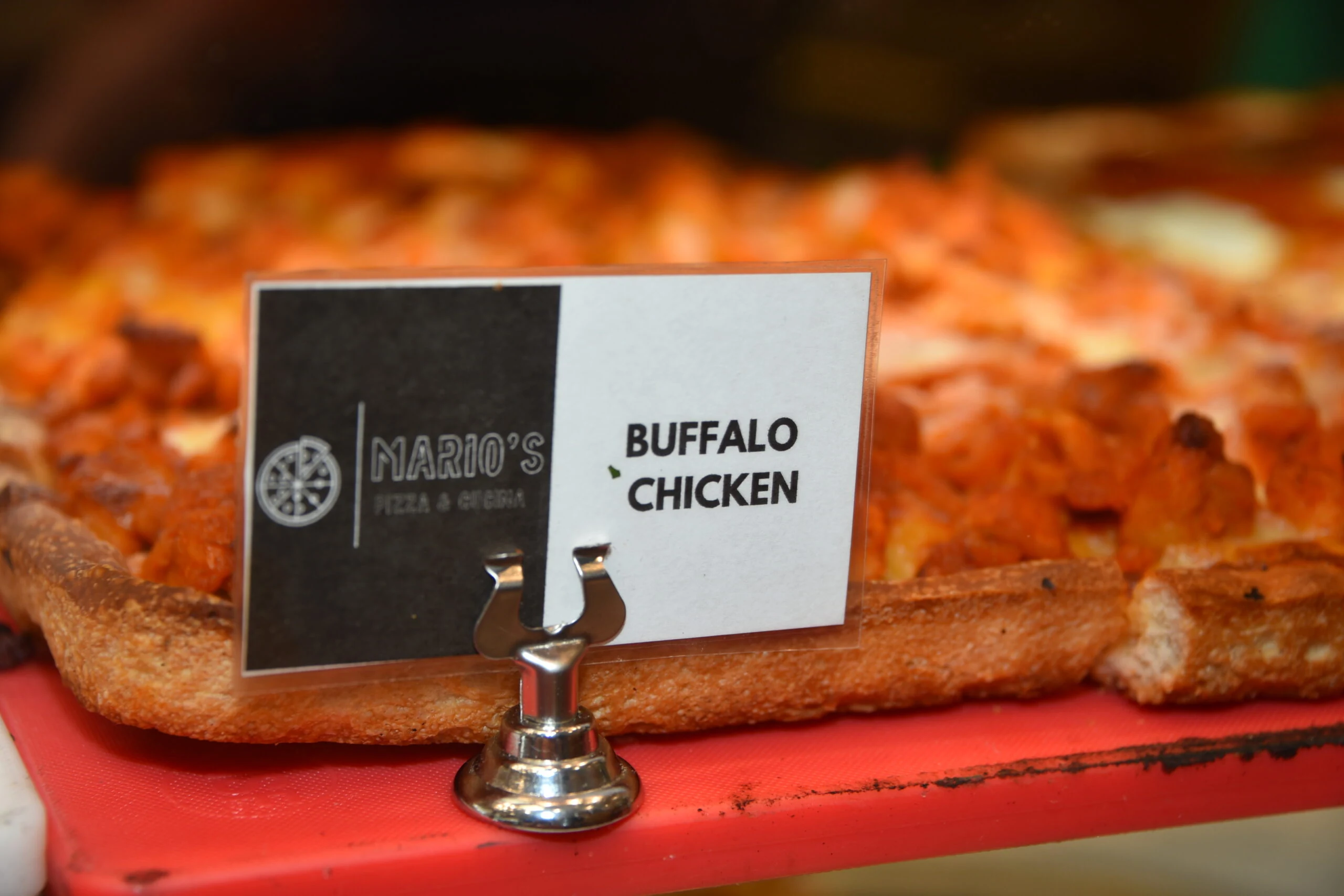Classic New York-style pizza by the slice
